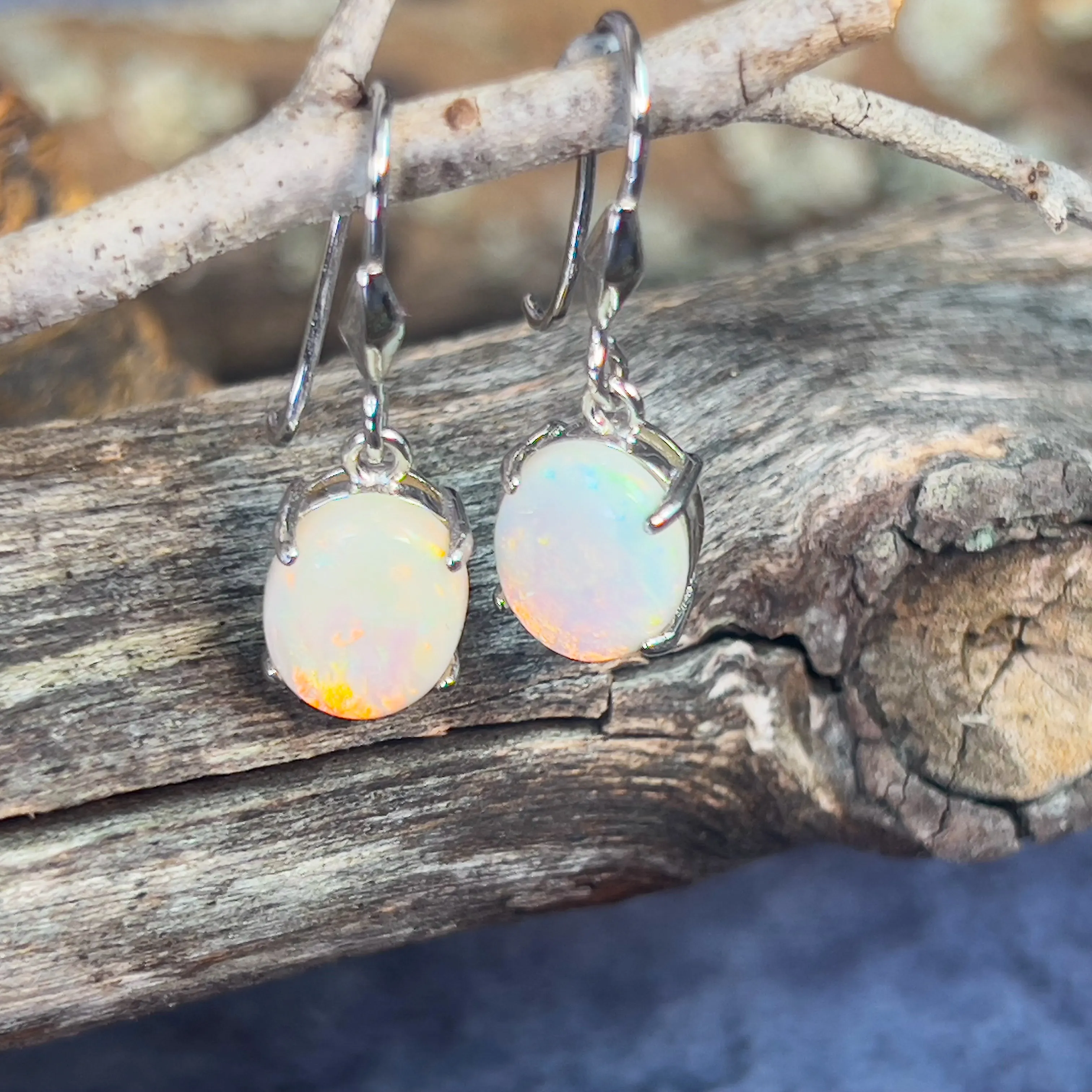 Sterling Silver dangling 10x8mm White Opal earrings